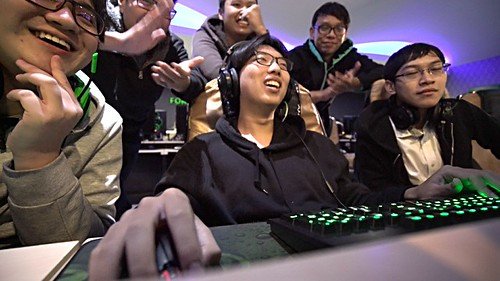 Friends laughing together while gaming and picking funny gamertags